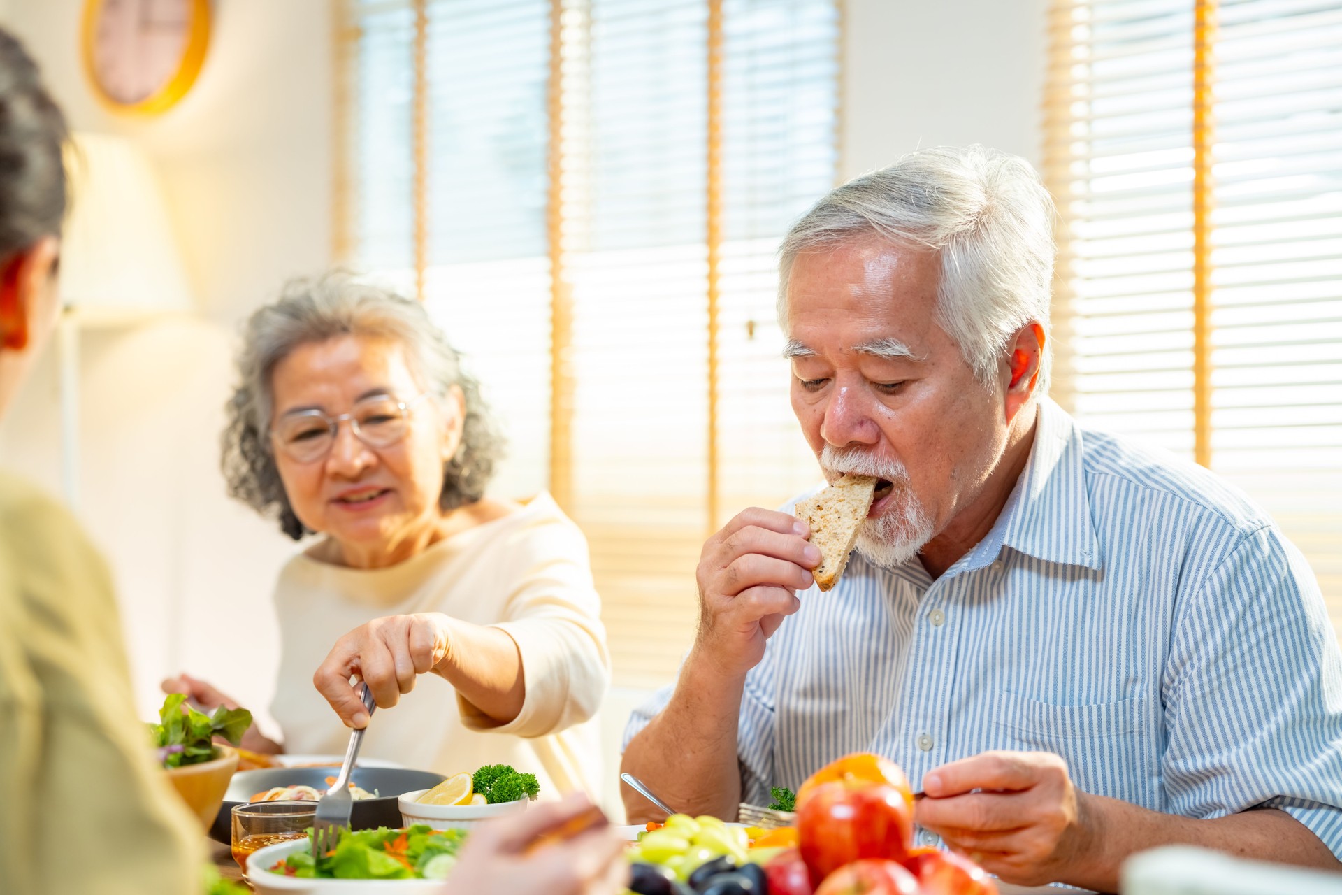 Asian family spending time together at home.